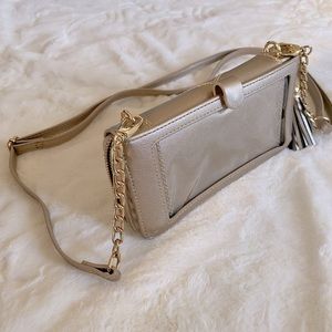 Gold shimmer crossbody purse with phone holder